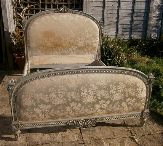 An early 20th century French painted upholstered double bed frame (King size) W.160cm